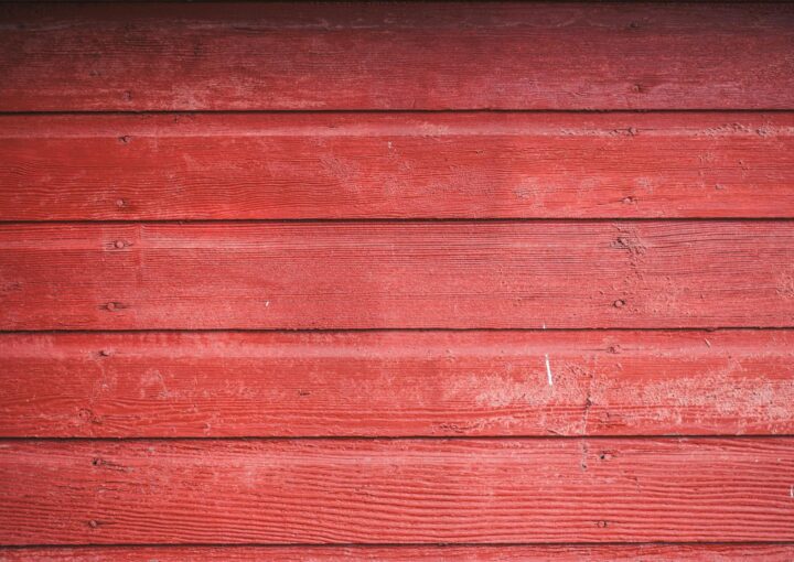 wooden nailed red siding