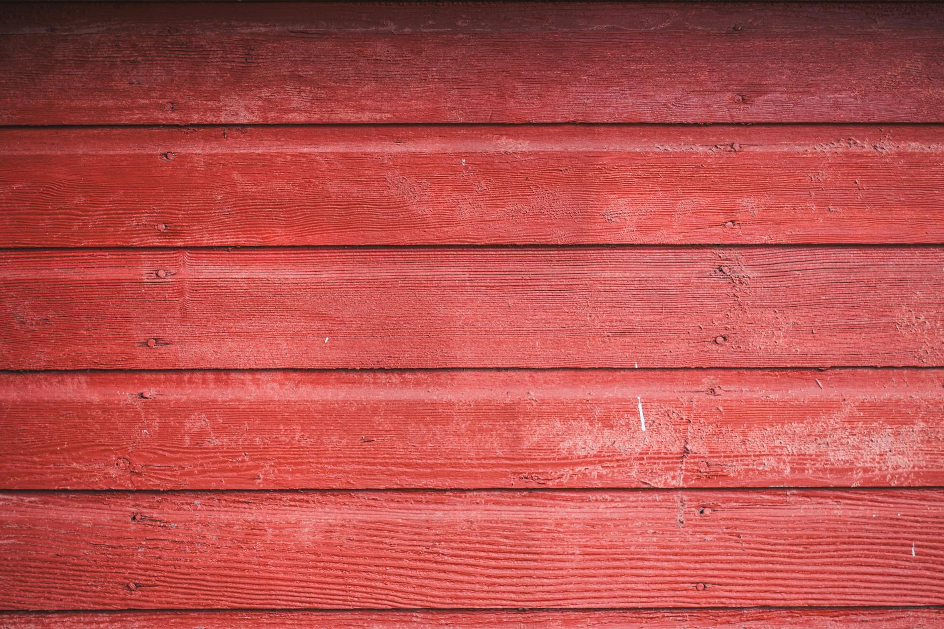 wooden nailed red siding